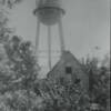 1st City Hall located North of the water tower which is now a parking lot at North and Court Street.