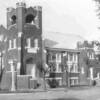 The United Methodist Church located at Bridge Street and South Street. Note the brick crowns on the bell tower. The crowns were removed due to problems with leaks. The Church building was built and dedicated in 1911 and features beautiful stained glass.