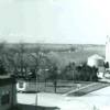 Factory Street looking north from First Street. Note the elevator still standing where today the K-43 river bridge stands. Also on the West side of the street is the Martin Lumber company.